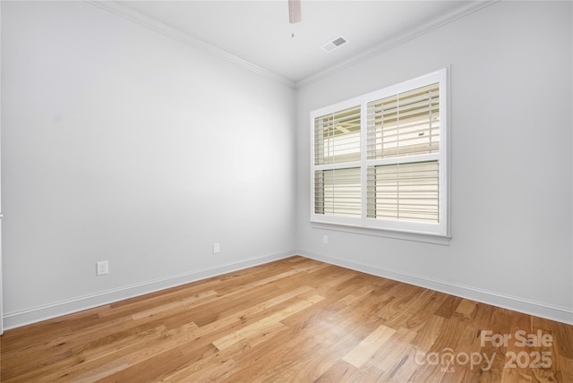 3008 Laney Pond Rd, Matthews, NC 28104 - unfurnished room with ornamental molding, light wood-type flooring, baseboards, and a ceiling fan