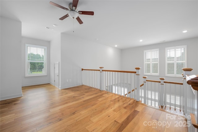 3008 Laney Pond Rd, Matthews, NC 28104 - unfurnished room with hardwood / wood-style floors, ceiling fan, recessed lighting, and baseboards
