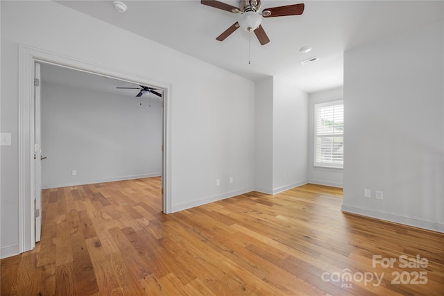 3008 Laney Pond Rd, Matthews, NC 28104 - spare room with ceiling fan, light wood-style floors, a smoke detector, and baseboards