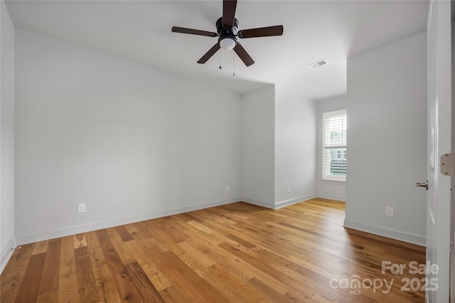 3008 Laney Pond Rd, Matthews, NC 28104 - empty room featuring light wood-type flooring, ceiling fan, and baseboards