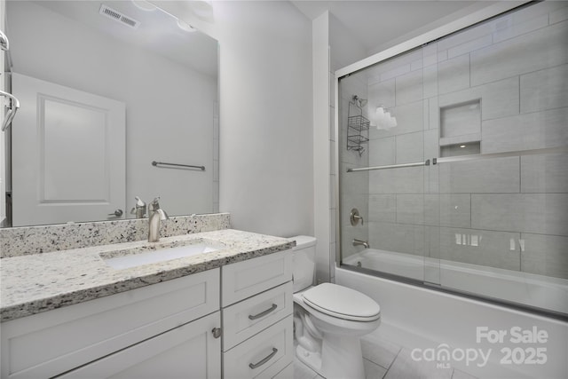 3008 Laney Pond Rd, Matthews, NC 28104 - full bath with vanity, toilet, enclosed tub / shower combo, and tile patterned floors