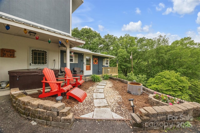 242 Ladd Parsons Rd, Crumpler, NC 28617 - covered porch featuring a hot tub