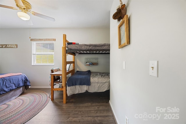 242 Ladd Parsons Rd, Crumpler, NC 28617 - bedroom with dark wood finished floors, baseboards, and ceiling fan