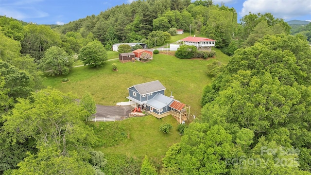 242 Ladd Parsons Rd, Crumpler, NC 28617 - view of subject property featuring a heavily wooded area