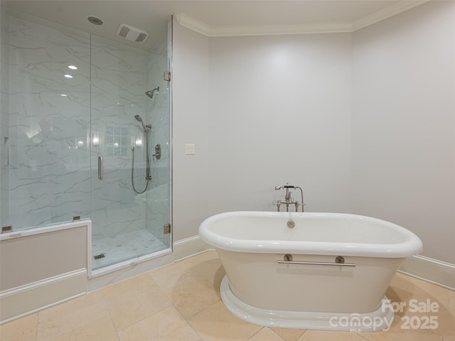 50 Brookline Dr, Asheville, NC 28803 - full bathroom with a soaking tub, a marble finish shower, baseboards, ornamental molding, and tile patterned floors