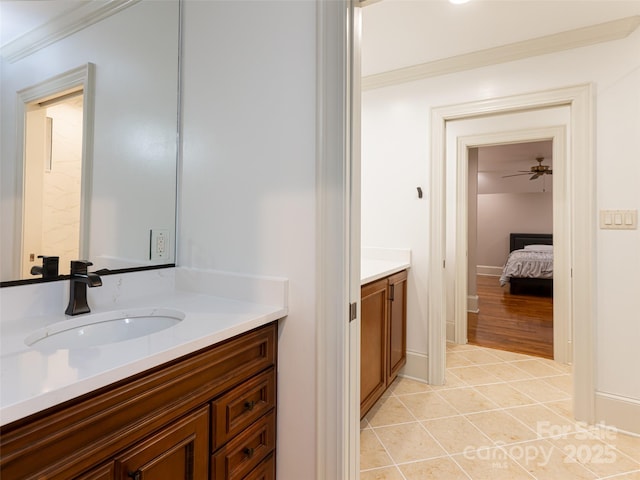 50 Brookline Dr, Asheville, NC 28803 - bathroom featuring vanity, ornamental molding, tile patterned floors, and baseboards