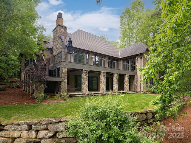 50 Brookline Dr, Asheville, NC 28803 - rear view of property with a balcony, stone siding, a lawn, a chimney, and roof with shingles