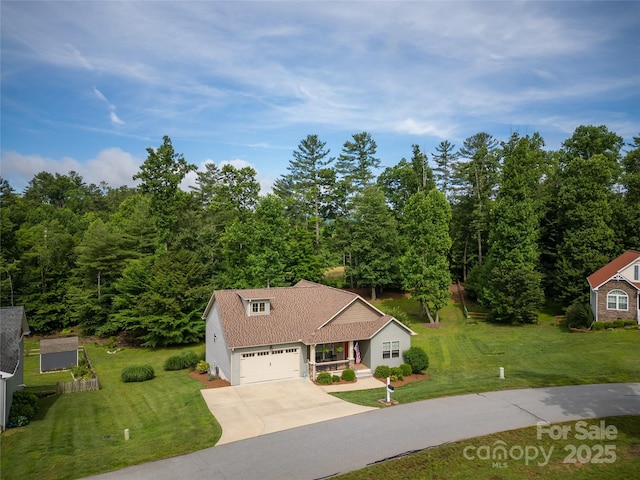 54 Asher Ln, Etowah, NC 28729 - traditional-style house with concrete driveway, a front yard, and an attached garage