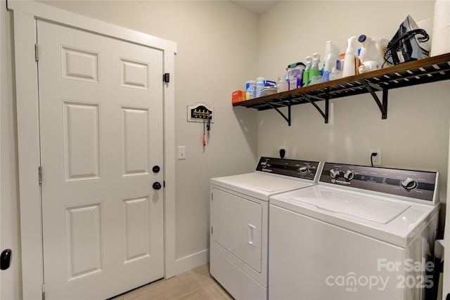 54 Asher Ln, Etowah, NC 28729 - laundry area featuring independent washer and dryer and baseboards