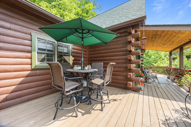 158 Raven Blvd, Lake Lure, NC 28746 - wooden terrace with outdoor dining space