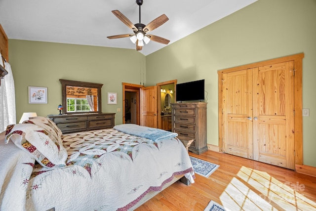 158 Raven Blvd, Lake Lure, NC 28746 - bedroom with light wood-type flooring, high vaulted ceiling, and ceiling fan