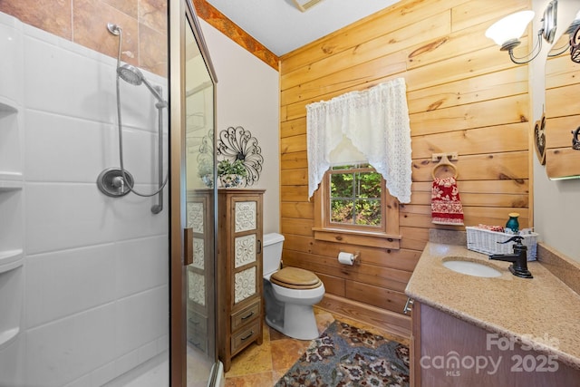 158 Raven Blvd, Lake Lure, NC 28746 - full bath featuring vanity, wooden walls, a shower stall, and toilet