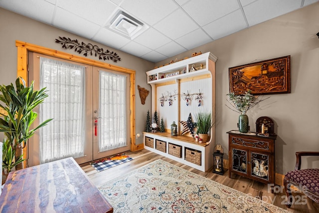 158 Raven Blvd, Lake Lure, NC 28746 - mudroom featuring french doors, wood finished floors, a drop ceiling, and baseboards