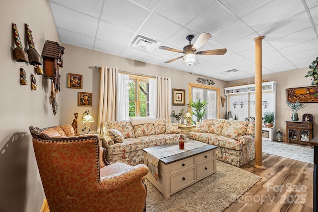 158 Raven Blvd, Lake Lure, NC 28746 - living room featuring a drop ceiling, light wood finished floors, and a ceiling fan