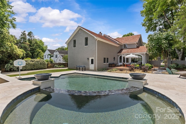 1619 Providence Rd, Charlotte, NC 28207 - view of swimming pool featuring a pool with connected hot tub and a patio