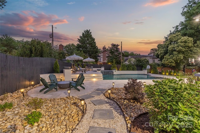 1619 Providence Rd, Charlotte, NC 28207 - view of pool with a fire pit, a patio area, and a fenced backyard