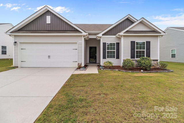 5314 Upton Pl, Charlotte, NC 28215 - view of front facade featuring board and batten siding, driveway, a garage, and a front yard