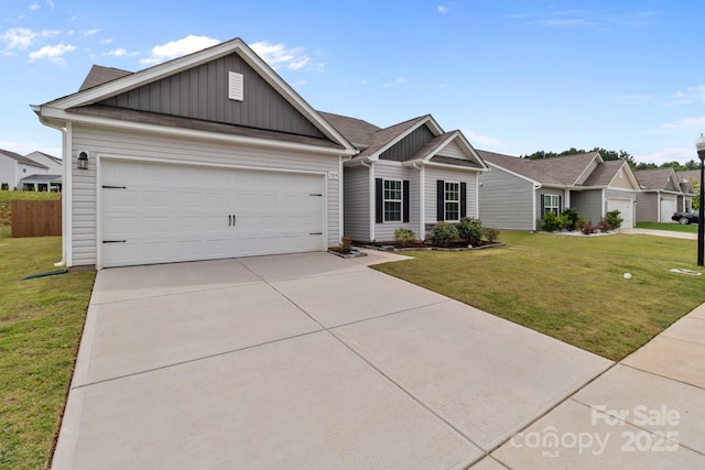 5314 Upton Pl, Charlotte, NC 28215 - view of front of property featuring board and batten siding, a garage, driveway, and a front yard