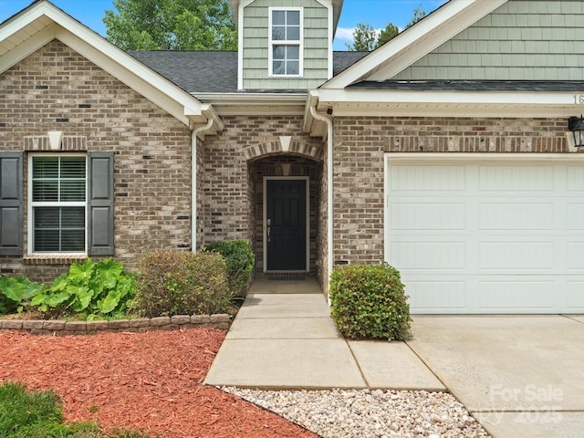 1660 Beleek Ridge Ln, Lake Wylie, SC 29710 - property entrance featuring a garage, brick siding, and roof with shingles
