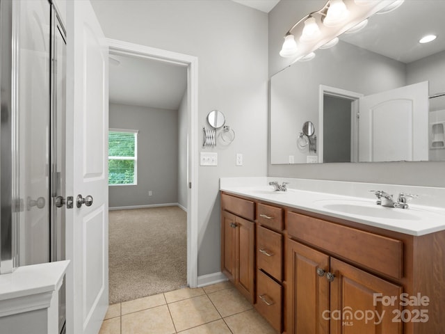 1660 Beleek Ridge Ln, Lake Wylie, SC 29710 - full bathroom featuring double vanity, tile patterned floors, and baseboards