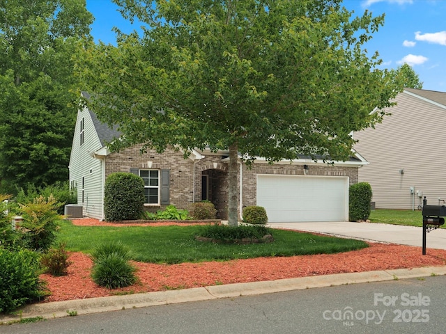 1660 Beleek Ridge Ln, Lake Wylie, SC 29710 - view of property hidden behind natural elements with brick siding, an attached garage, concrete driveway, a front yard, and central AC