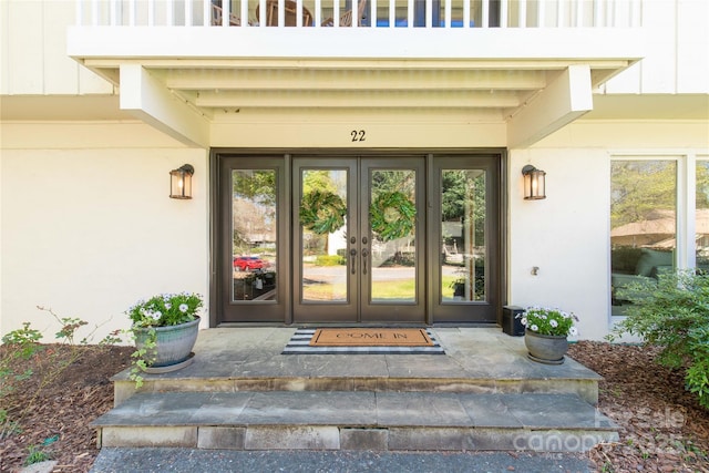 22 Honeysuckle Ln, Clover, SC 29710 - property entrance with french doors and stucco siding