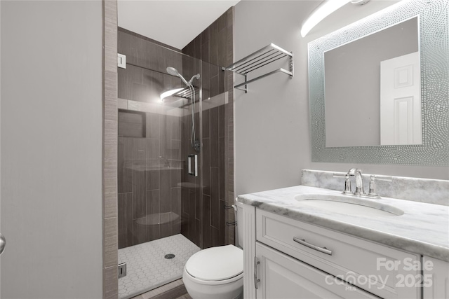 22 Honeysuckle Ln, Clover, SC 29710 - bathroom with vanity, a shower stall, and toilet