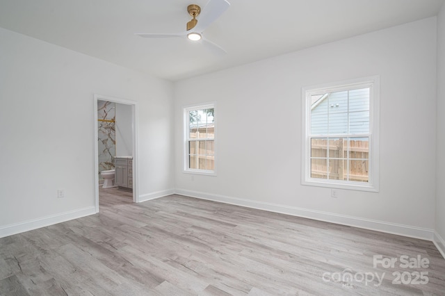 520 E Main St, Dallas, NC 28034 - spare room with a ceiling fan, light wood finished floors, and baseboards
