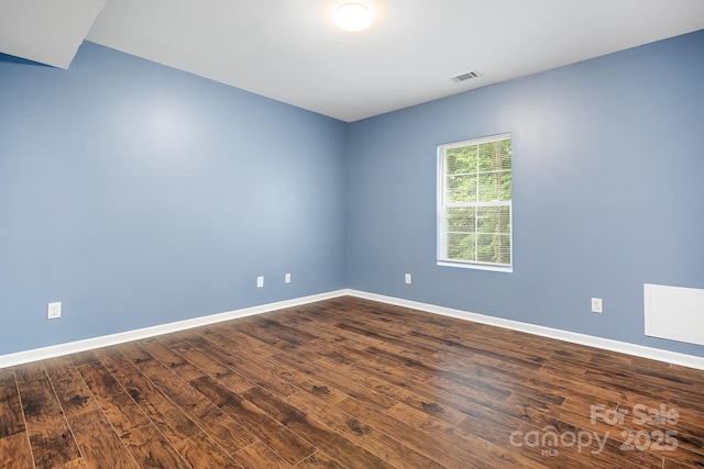 2695 Queens Rd, Lincolnton, NC 28092 - spare room featuring dark wood-style floors and baseboards