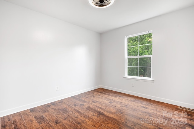 2695 Queens Rd, Lincolnton, NC 28092 - unfurnished room featuring baseboards and dark wood finished floors