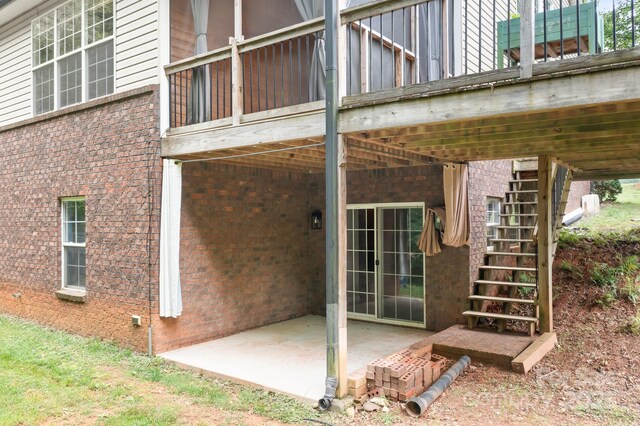 2695 Queens Rd, Lincolnton, NC 28092 - back of property featuring stairway, a patio area, and brick siding