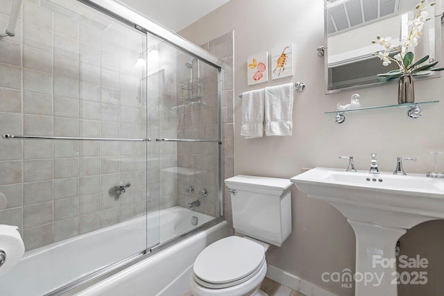 21 Rhododendron Rd, Black Mountain, NC 28711 - bathroom with toilet and combined bath / shower with glass door