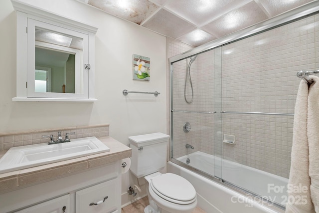21 Rhododendron Rd, Black Mountain, NC 28711 - full bathroom featuring toilet, bath / shower combo with glass door, and vanity
