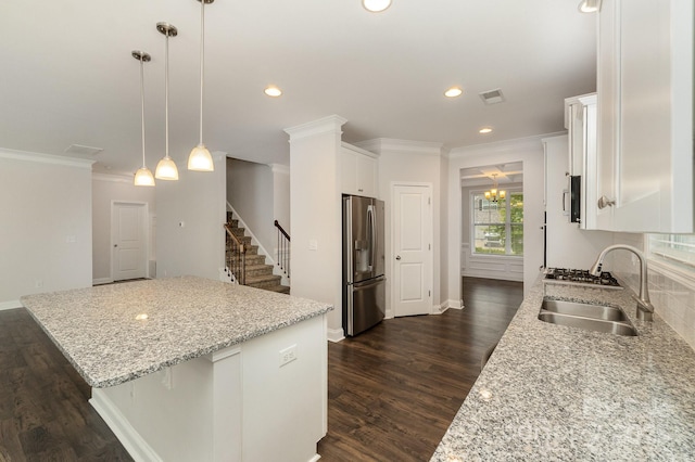 732 Altamonte Dr, Clover, SC 29710 - kitchen with stainless steel fridge, a sink, white cabinets, a kitchen island, and crown molding