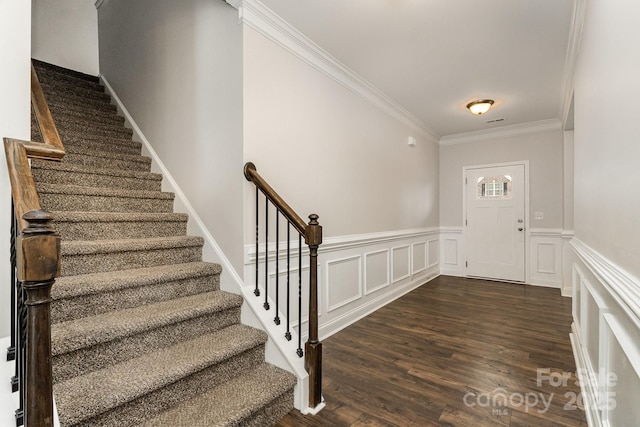 732 Altamonte Dr, Clover, SC 29710 - foyer entrance with ornamental molding, stairs, dark wood finished floors, wainscoting, and a decorative wall