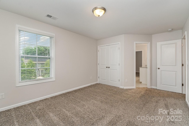 732 Altamonte Dr, Clover, SC 29710 - unfurnished bedroom with carpet flooring, baseboards, and a closet