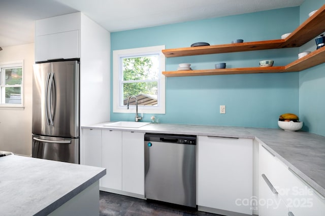 189 Onteora Blvd, Asheville, NC 28803 - kitchen featuring stainless steel appliances, a sink, open shelves, and white cabinets