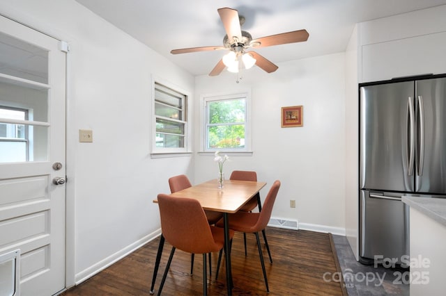 189 Onteora Blvd, Asheville, NC 28803 - dining room featuring dark wood finished floors, baseboards, and a ceiling fan