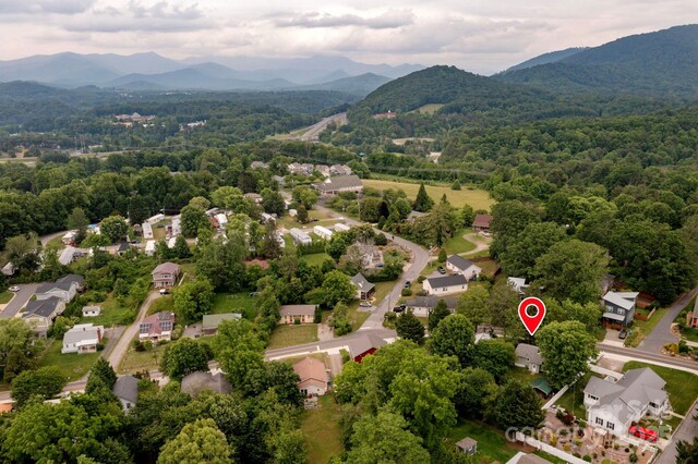 189 Onteora Blvd, Asheville, NC 28803 - aerial perspective of suburban area with a mountainous background and a heavily wooded area
