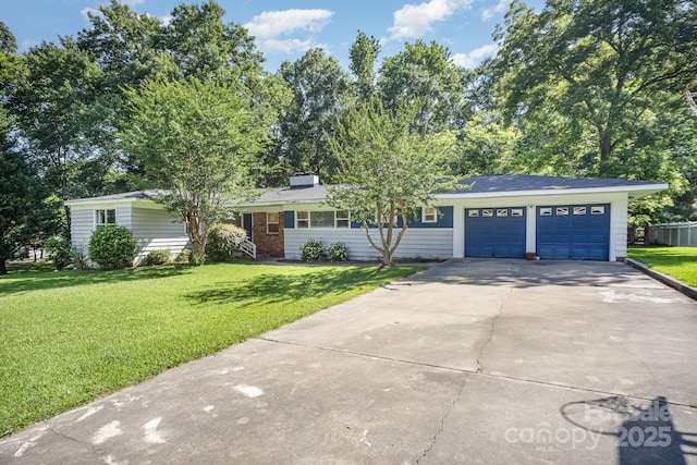 409 Edgewood Ct, Lancaster, SC 29720 - single story home with driveway, a front lawn, and an attached garage