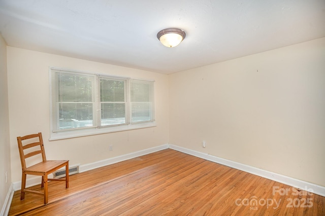 409 Edgewood Ct, Lancaster, SC 29720 - spare room featuring light wood-style flooring and baseboards