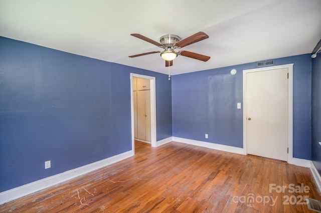 409 Edgewood Ct, Lancaster, SC 29720 - spare room with ceiling fan, wood finished floors, and baseboards