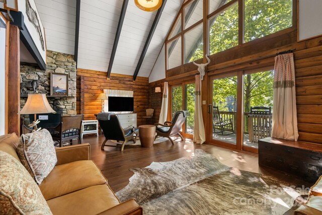 2827 Memorial Hwy, Lake Lure, NC 28746 - living room with high vaulted ceiling, wood finished floors, and wood ceiling with exposed beams