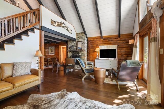 2827 Memorial Hwy, Lake Lure, NC 28746 - living area with wood-type flooring, a fireplace, wooden walls, wood ceiling, and stairway