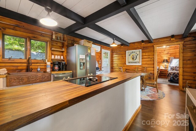 2827 Memorial Hwy, Lake Lure, NC 28746 - kitchen featuring wood counters, appliances with stainless steel finishes, a sink, dark wood finished floors, and plenty of natural light