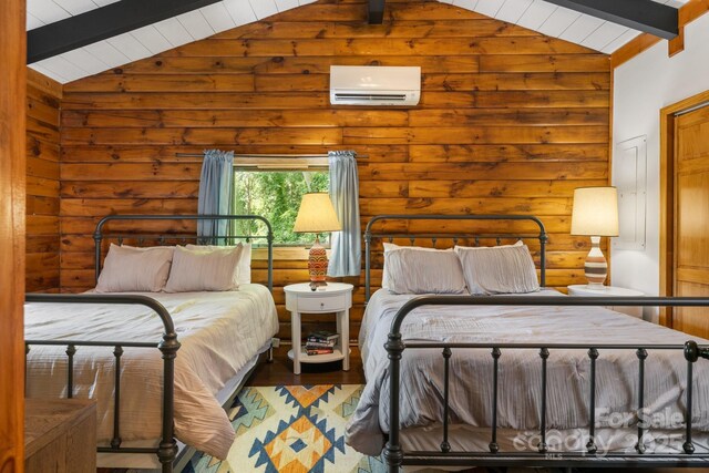 2827 Memorial Hwy, Lake Lure, NC 28746 - bedroom featuring a wall unit AC and wood finished floors