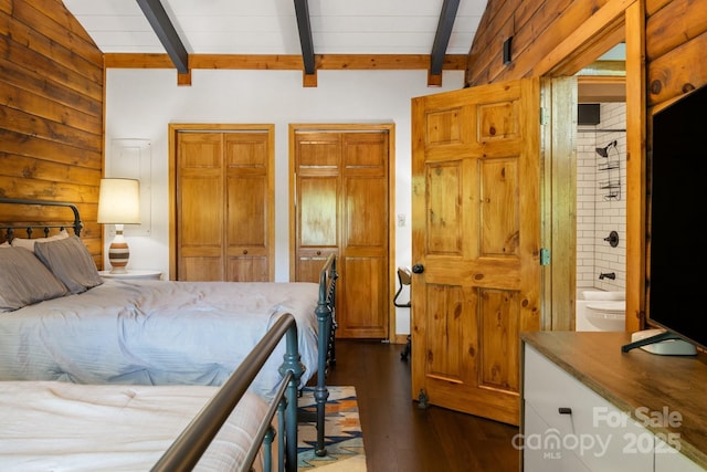 2827 Memorial Hwy, Lake Lure, NC 28746 - bedroom featuring dark wood-type flooring and two closets