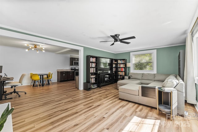 1072 5th St NE, Hickory, NC 28601 - living area with light wood-style floors, ornamental molding, and a ceiling fan