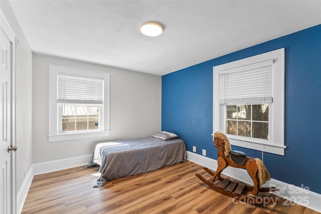 1072 5th St NE, Hickory, NC 28601 - bedroom featuring wood finished floors