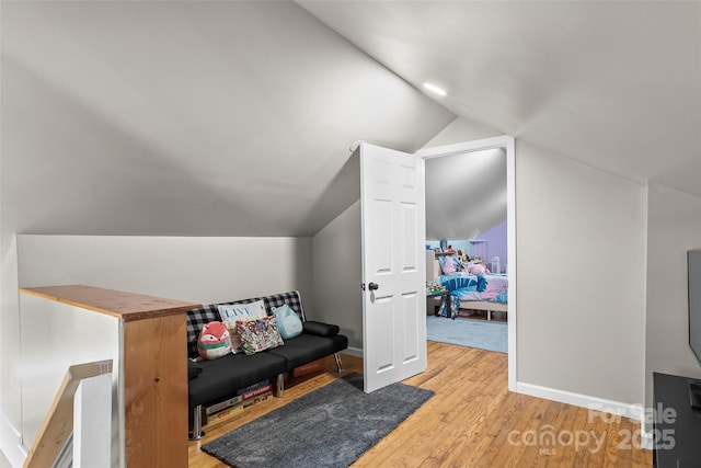1072 5th St NE, Hickory, NC 28601 - sitting room with light wood finished floors and vaulted ceiling